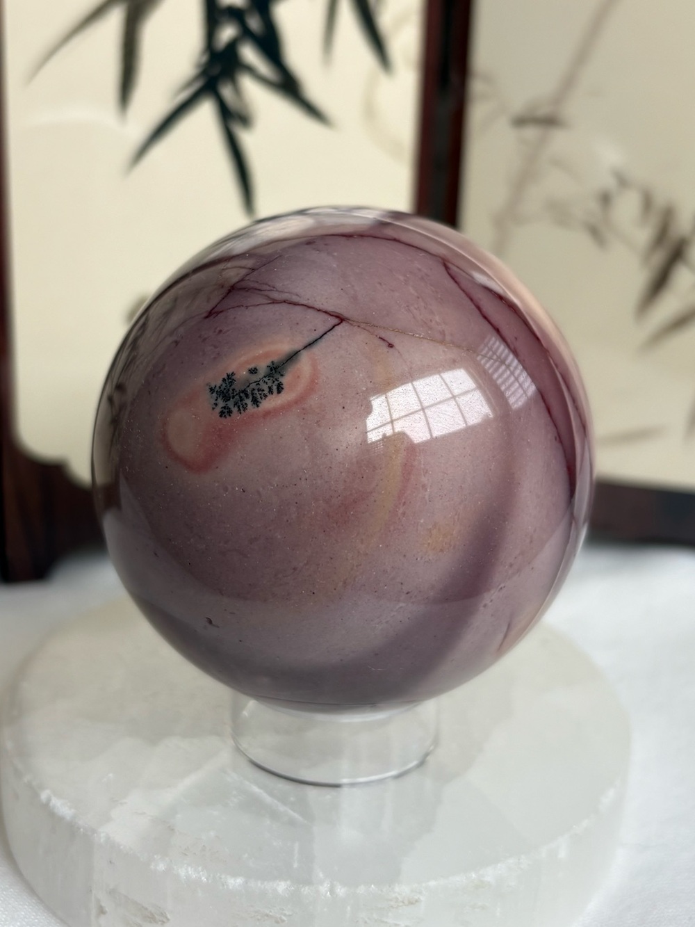 Purple mookaite sphere wirh dendrite